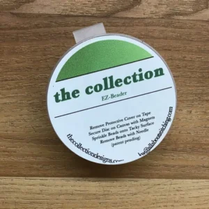 A wooden table with a round sticker on it.