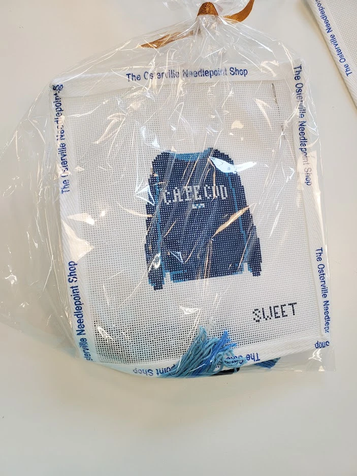 A bag of blue stuff sitting on top of a table.