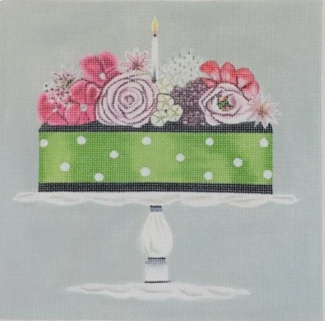 A painting of a cake with flowers on it