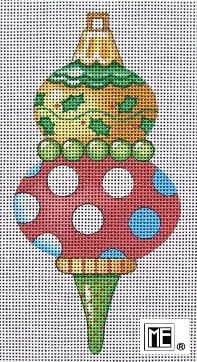 A cross stitch pattern of an ornament with polka dots.