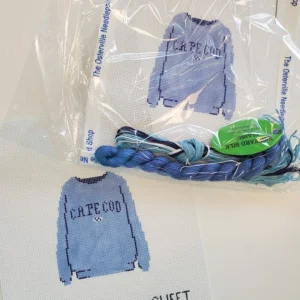 A bag of clothes is shown with the name of the shirt.
