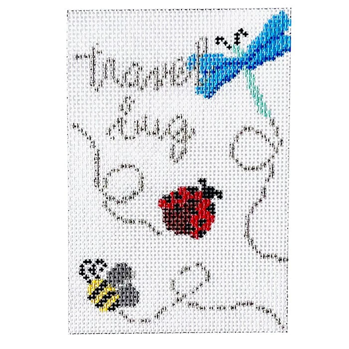 A cross stitch pattern of bugs and insects.