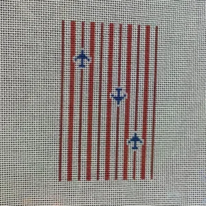 A red and white striped pattern with blue anchors.