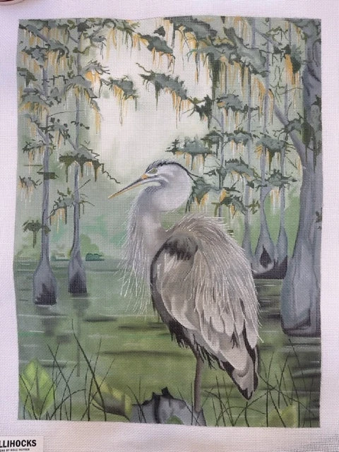 A painting of an egret in the swamp