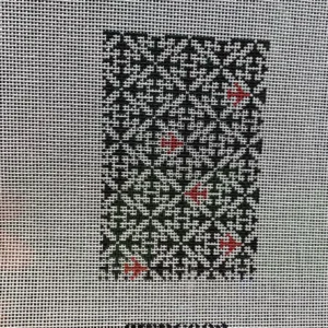 A black and white pattern with red accents.