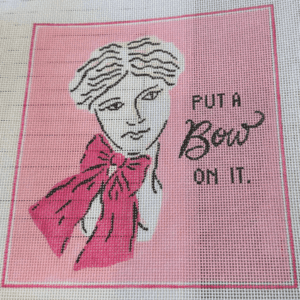 A pink and white picture of a woman with a bow.