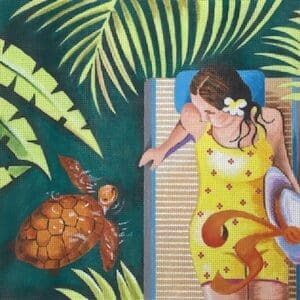 Woman in yellow dress by sea turtle