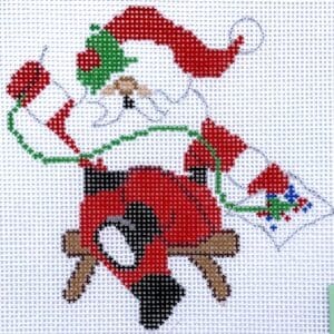 Needlepointing Santa