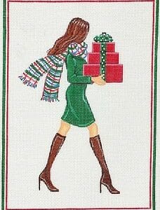 Woman in green dress carrying wrapped gifts