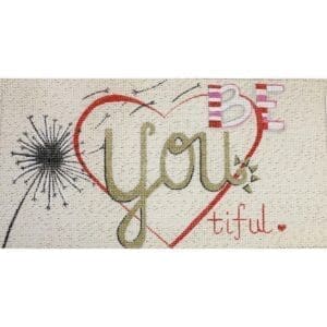 Embroidered heart with "you" and dandelion