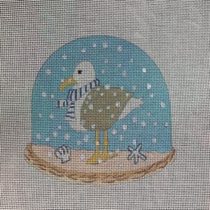Seagull in a snow globe