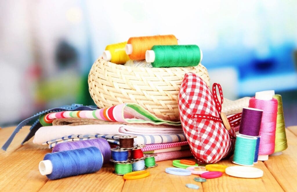 Colorful sewing threads, buttons, and fabrics
